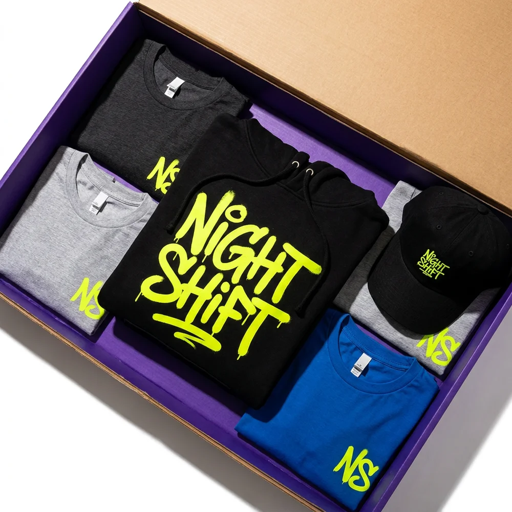 Neon branded hoodie and cap in a purple box